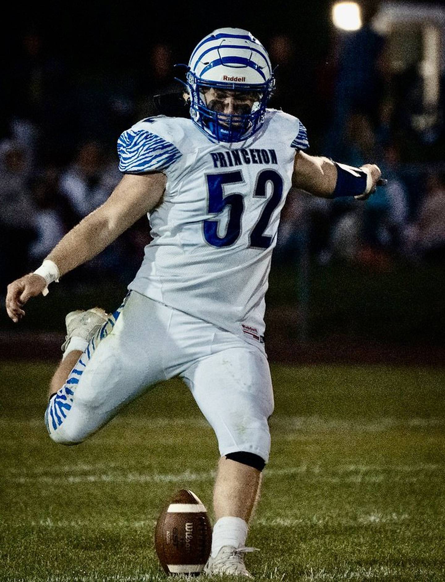 Princeton senior Ian Morris kicks off for the Tigers Friday night at Rockridge. He made two second-half field goals to seal the Tigers' 27-18 victory.