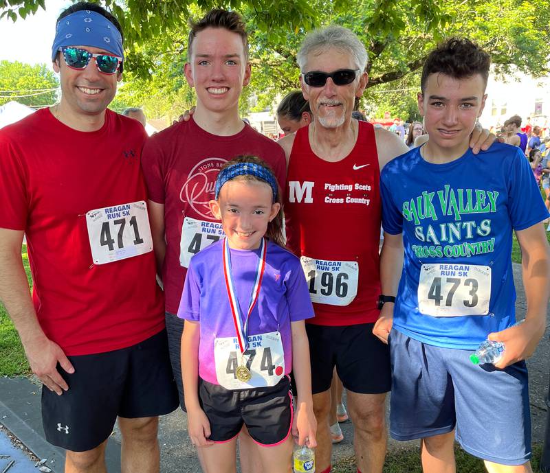 Dr. Joe Welty, his son Anthony, and Anthony’s children, Ryan, Danny, and Natalie, celebrate their finish at the 2022 Reagan Run in Dixon.