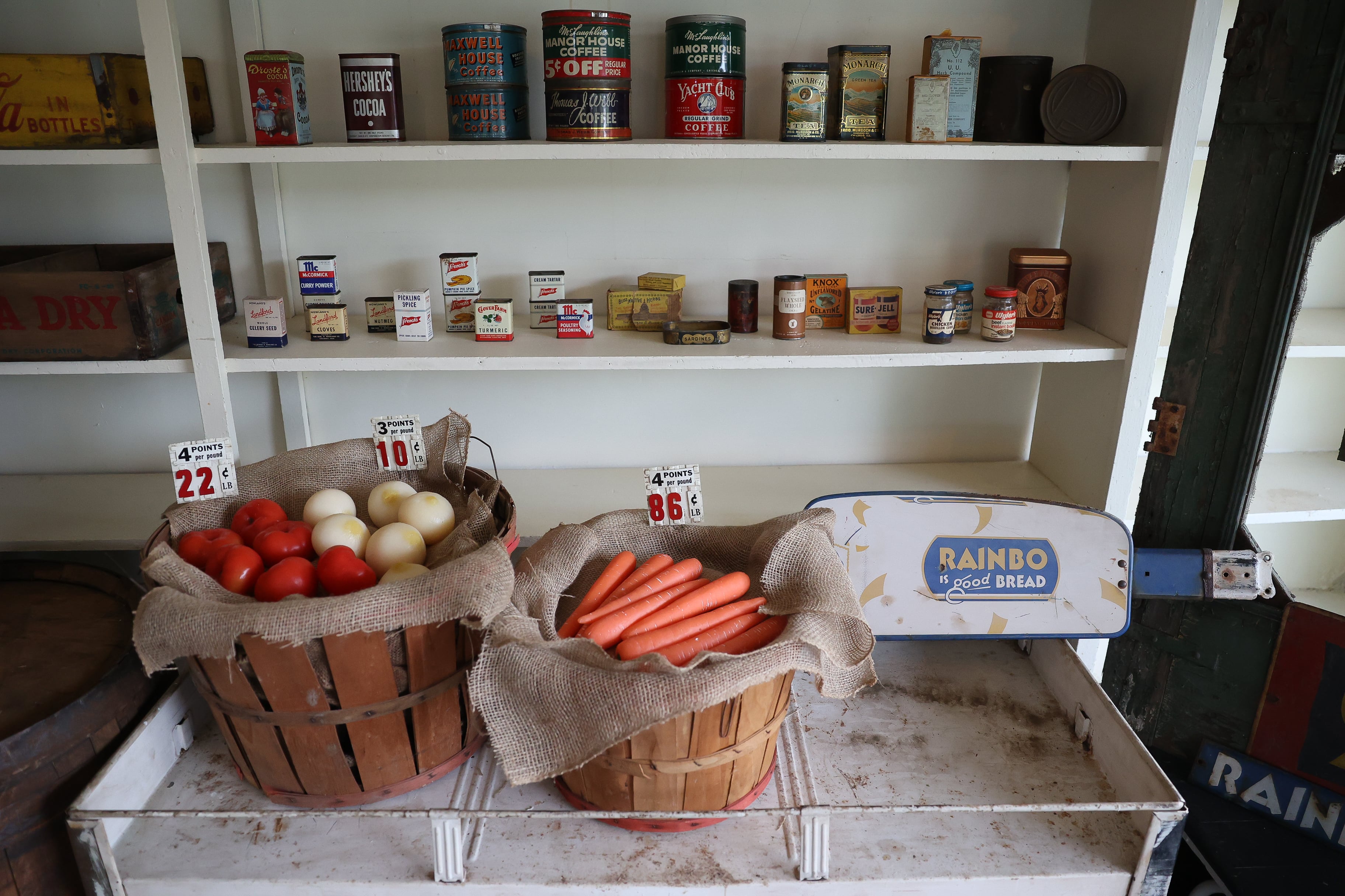 Produce from the 30’s and 40’s, most found in the basement of the old Slovenian grocery store, sit on the shelves at the Emma Planinsek Grocery and Meat Market Museum on Thursday, Sept. 29, 2023.