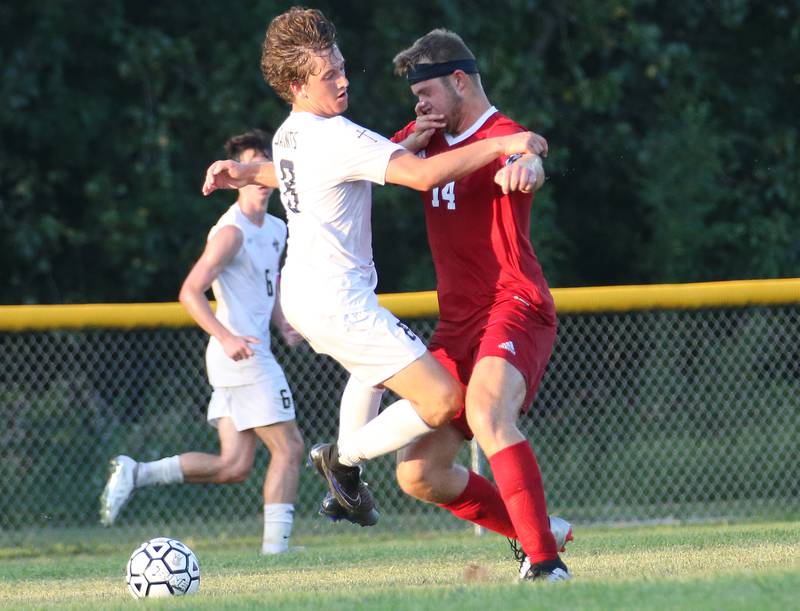 Streator's Landon Muntz draws a foul on Bloomington Central Catholic's Benjamin Dappen on Wednesday, Aug. 23, 2023 at St. James Street Recreation Area in Streator.