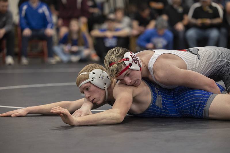 Fulton’s Skylier Crooks works on Newman’s Daniel Kelly at 157 pounds for the the title Saturday, Feb. 3, 2024 during the class 1A Fulton wrestling regionals.