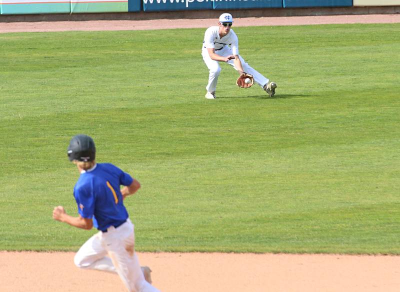 Newman's Joe Oswalt fields a ground ball as Maroa-Forsyth's Mitch Williams rounds second base during the Class 2A semifinal game on Friday, May 31, 2024 at Dozer Park in Peoria.