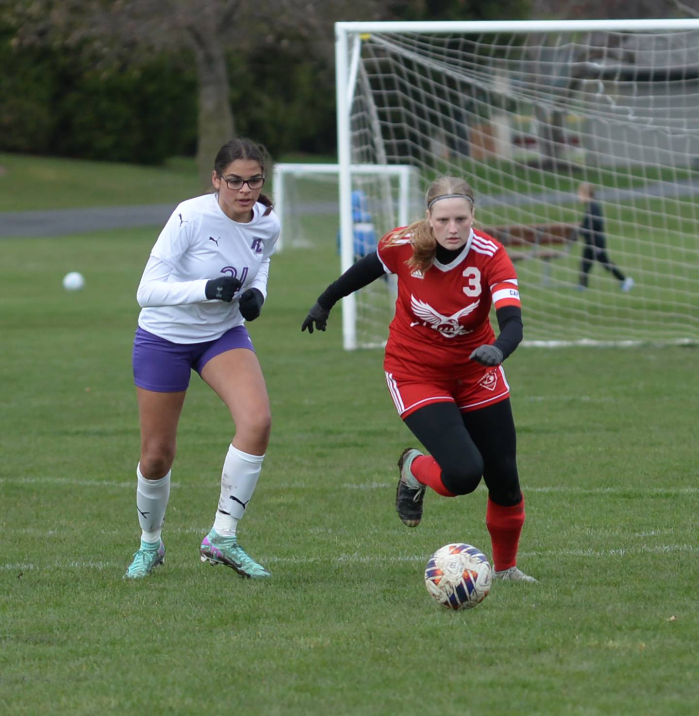 Oregon's Deborah Schmid (3) chases down a pass against Rockford Lutheran on Thursday, April 4, 2024 at Oregon Park West.