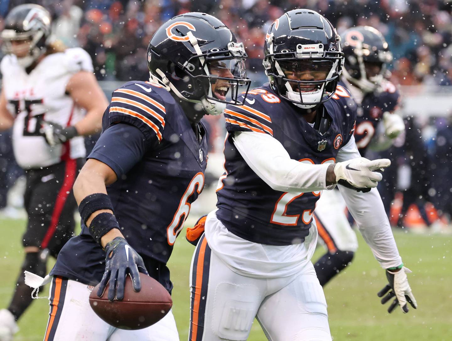 Chicago Bears cornerback Kyler Gordon celebrates his interception with cornerback Tyrique Stevenson during their game against the Atlanta Falcons Sunday, Dec. 31, 2023, at Soldier Field in Chicago.