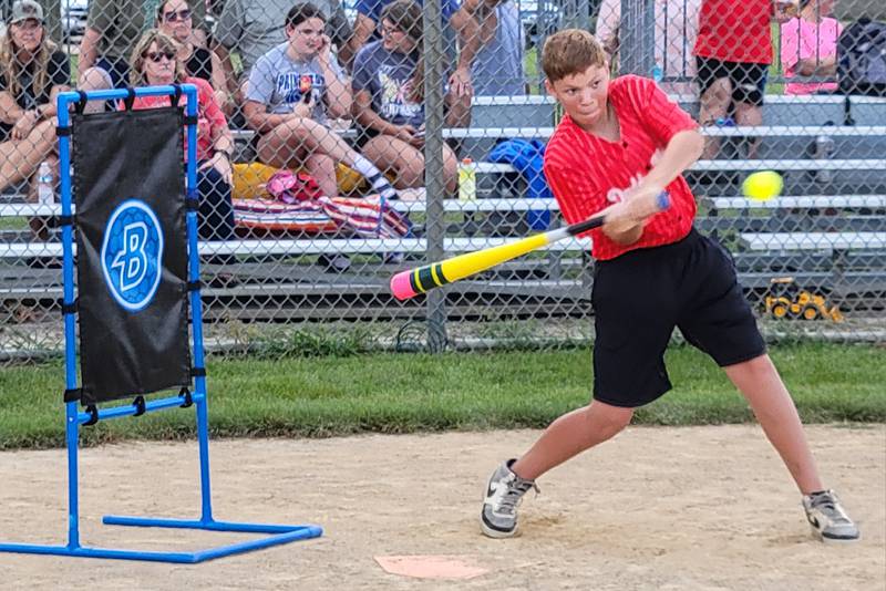 Daddy Hack batter Eli Ozburn takes a cut at a pitch during the Not-So-National Blitzball World Series at Zearing Park in Princeton.