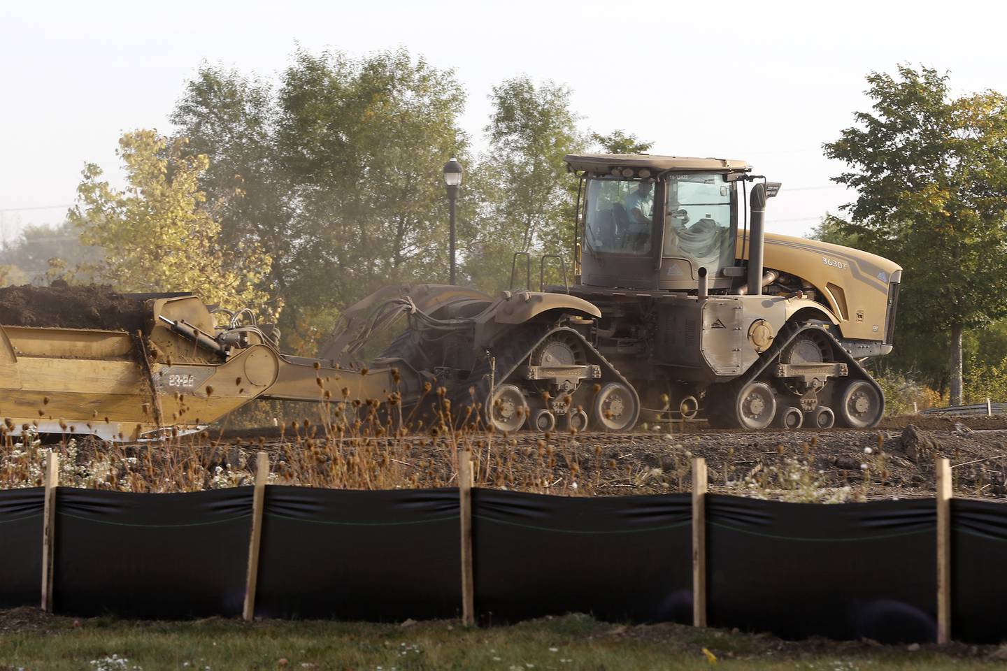 Construction equipment is seen working Thursday, Sept. 30, 2021, in a field at the intersection of Central Park Boulevard and Leland Lane in Huntley. A plan was approved last month to build more homes at the location, which would be an extension of the Cider Grove subdivision.