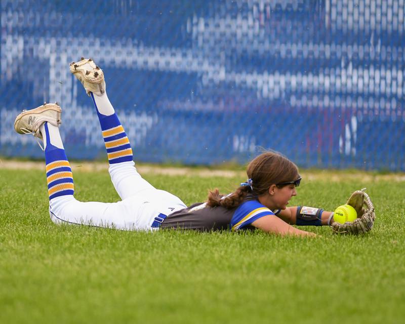 Wheaton North's Makayla Grantz(4) lays out and catches the ball during the first inning of the game against Glenbard North on Monday May 13, 2024, held at Wheaton North High School.