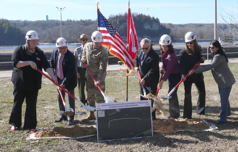 U.S. U.S. Sen. Dick Durbin, D-Illinois (first from right) gathered for a groundbreaking for the new Starved Rock Breakwater project at Starved Rock Lock and Dam on Tuesday, Feb. 13, 2024 near Starved Rock State Park. The Starved Rock Breakwater project is a habitat restoration effort designed to restore submerged aquatic vegetation in the Illinois River, Starved Rock Pool. It will increase the amount and quality of resting and feeding habitat for migratory waterfowl and improve spawning and nursery habitat for native fish.
Construction of the breakwater will involve placement of riprap along northern edge of the former Delbridge Island, adjacent to the navigation channel between River Mile 233 and 234. The breakwater structure will be approximately 6,100 feet long and constructed to a design elevation 461.85 feet, providing adequate protection to allow for submerged aquatic vegetation growth.
The estimated total cost of this project is between $5 and $10 million.