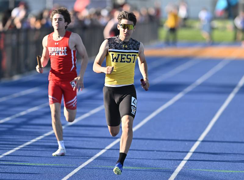 Joliet West's Joshua Calvert competing in the 4x200 relay during the IHSA 3A Sectional track meet  on Friday, May. 17, 2024, at Joliet.