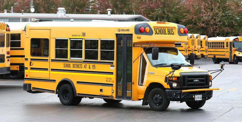 A Community High School District 155 and Crystal Lake School District 47 bus heads out on a route Wednesday, Oct. 25, 2017, from the Transportation Joint Agreement’s bus garage at 1204 S. McHenry Ave. in Crystal Lake.