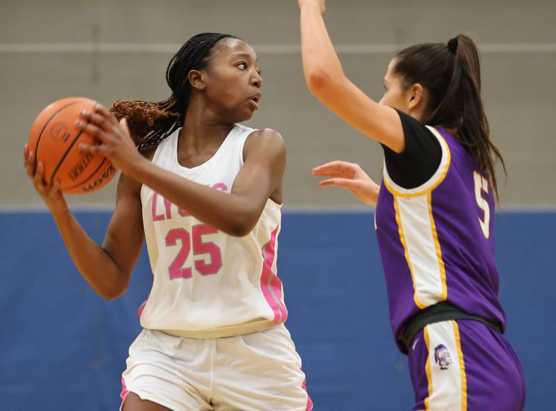 Lyons’ Nora Ezike (25) looks for an outlet during the girls varsity basketball game against Downers Grove North on Tuesday, Jan. 16, 2024 in La Grange, IL.