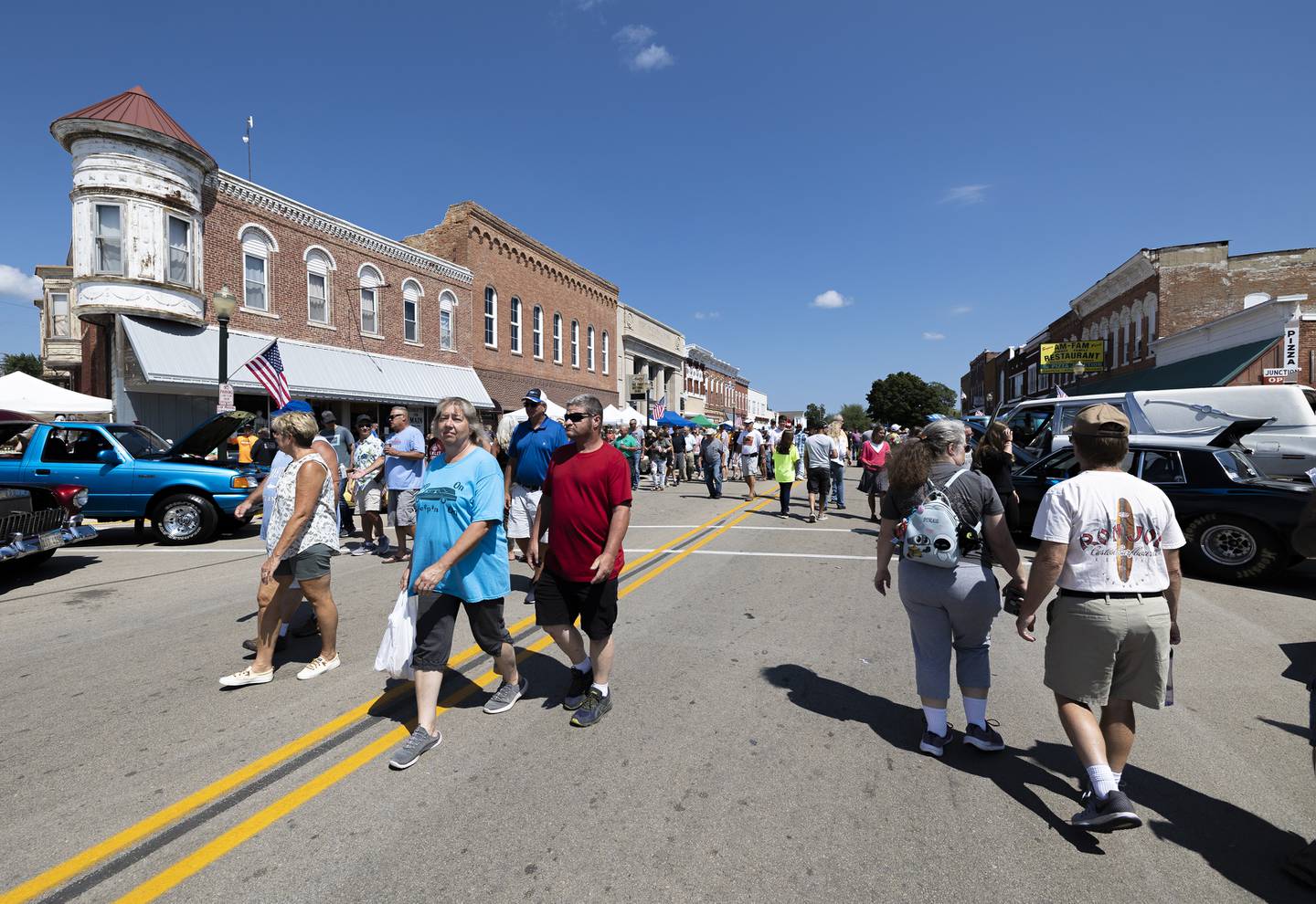 Thousands of people tour downtown Amboy Sunday, August 27, 2023 to admire the cars, trucks and motorcycles on display at the Depot Days car show.
