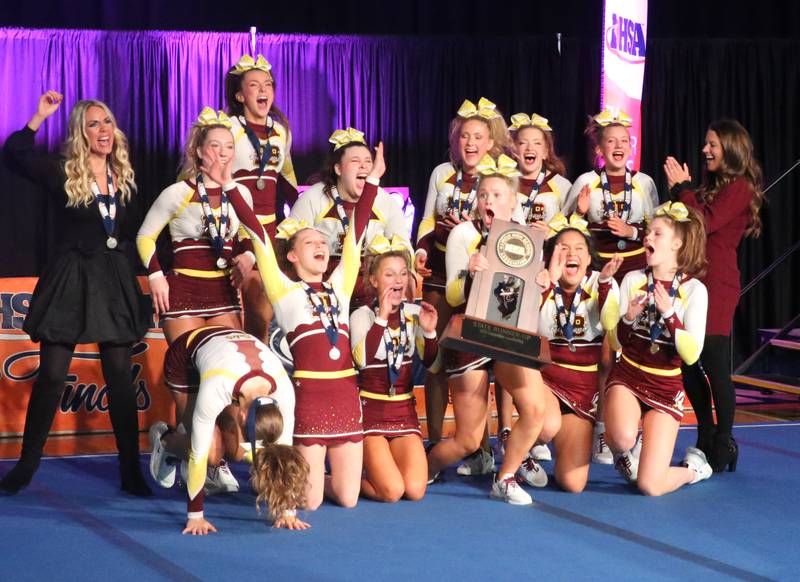 Members of the Richmond-Burton cheerleading team react after winning runner-up in the small team Competitive Cheerleading State Final Competition on Saturday, Feb. 3, 2024 at Grossinger Motors Arena in Bloomington.