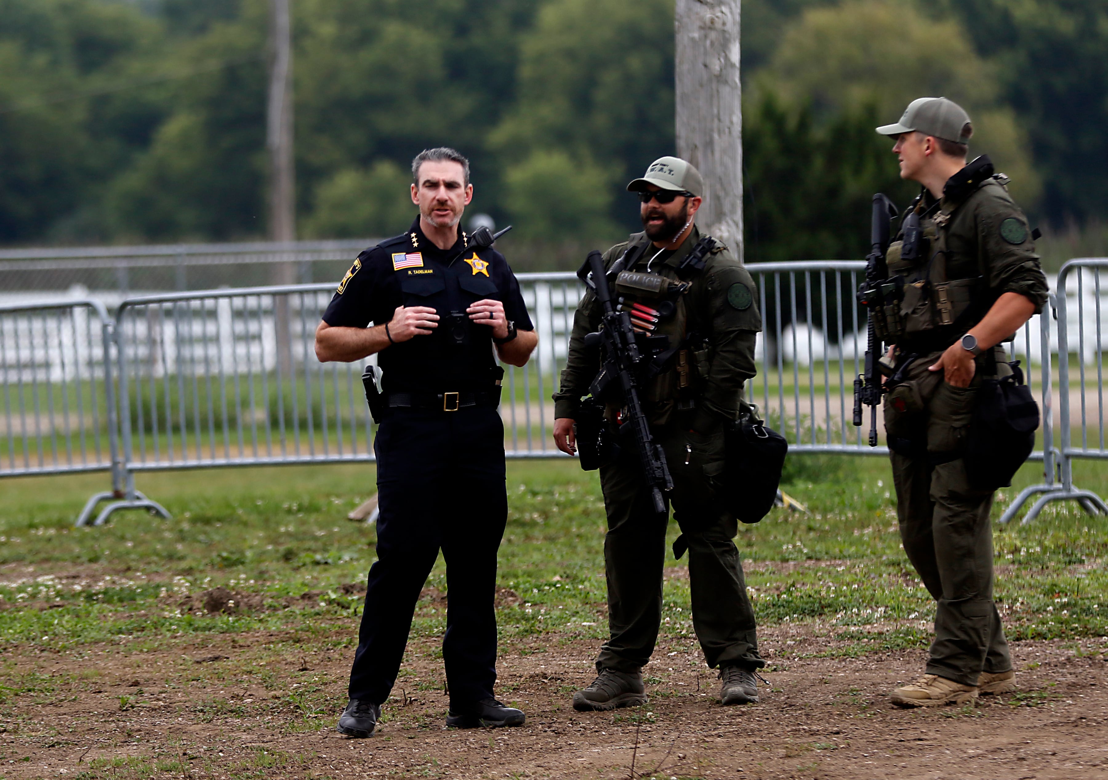 McHenry County Sheriff Robb Tadelman talks with officers during the Trump Now-Save the American Dream Rally at the McHenry County Fairgrounds on Sunday Aug. 18, 2024, in Woodstock.