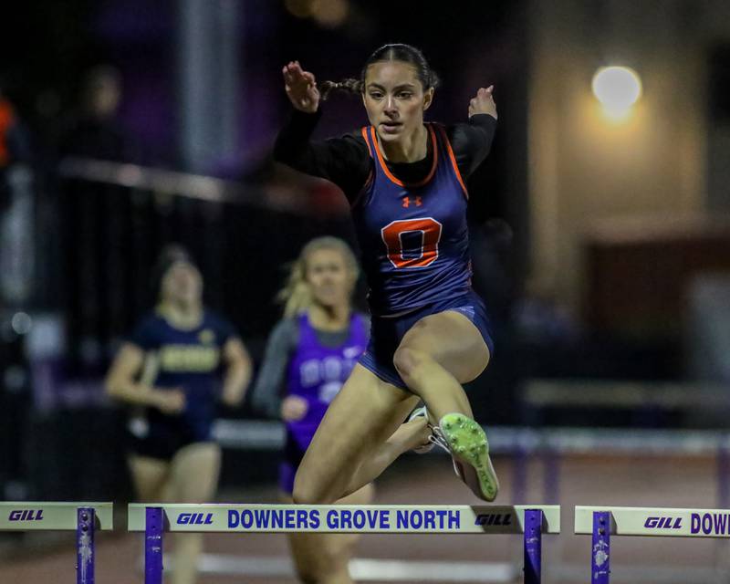 Oswego's Lauren Broome wins the 300-meter hurdles at Friday's Class 3A Downers Grove North Sectional Girls Track and Field meet.