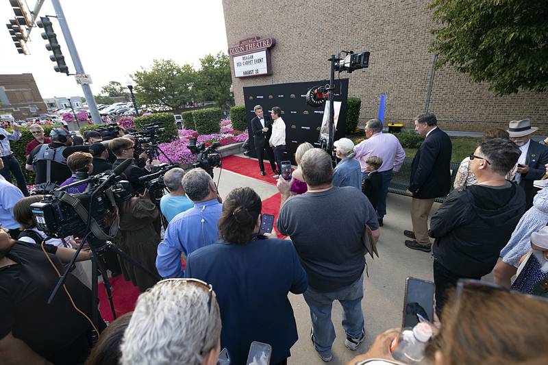 Media surrounds actor Dennis Quaid as he’s interviewed on the red carpet Thursday, Aug. 22, 2024 outside of The Dixon.