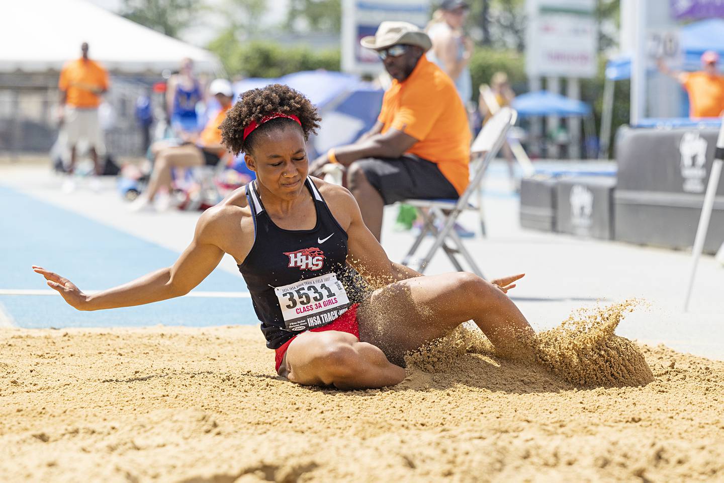 Huntley’s Dominique Johnson lands in the 3A long jump Saturday, May 18, 2024 at the IHSA girls state track meet in Charleston.