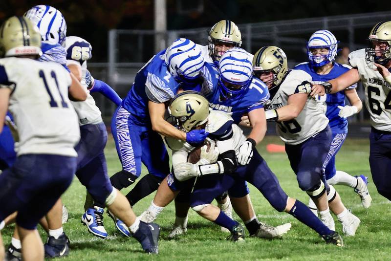 Princeton's Lane Goskusky (2) and Grady Cox (77) bring down Mercer County's Payton Sedam at Bryant Field on Friday.