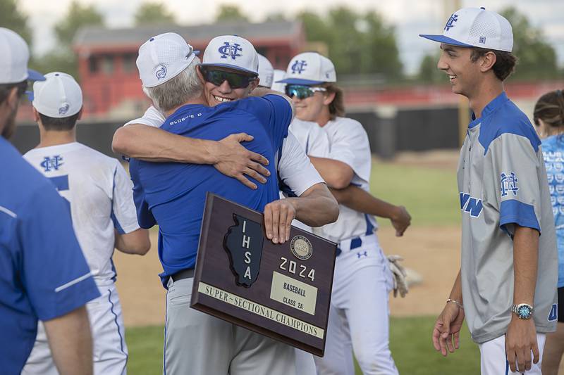 Newman celebrates their 6-2 win over Chicago Hope Monday, May 27, 2024 during the Class 2A super-sectional in Rockford.