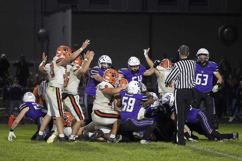 The Byron Tigers convert a successful 2-pt conversion to take a one point lead with 16 seconds left against Dixon Friday, Oct. 18, 2024, at A.C. Bowers Field in Dixon.