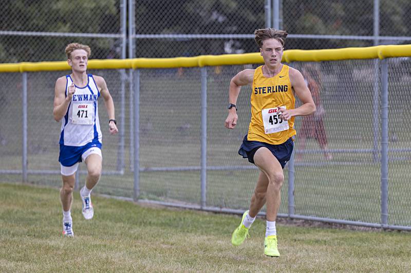 Sterling’s Parker Janssen leads Newman’s Lucas Simpson down the stretch to take second Tuesday, Sept. 12, 2023 during the Twin Cities Cross Country Meet at Centennial Park in Rock Falls.