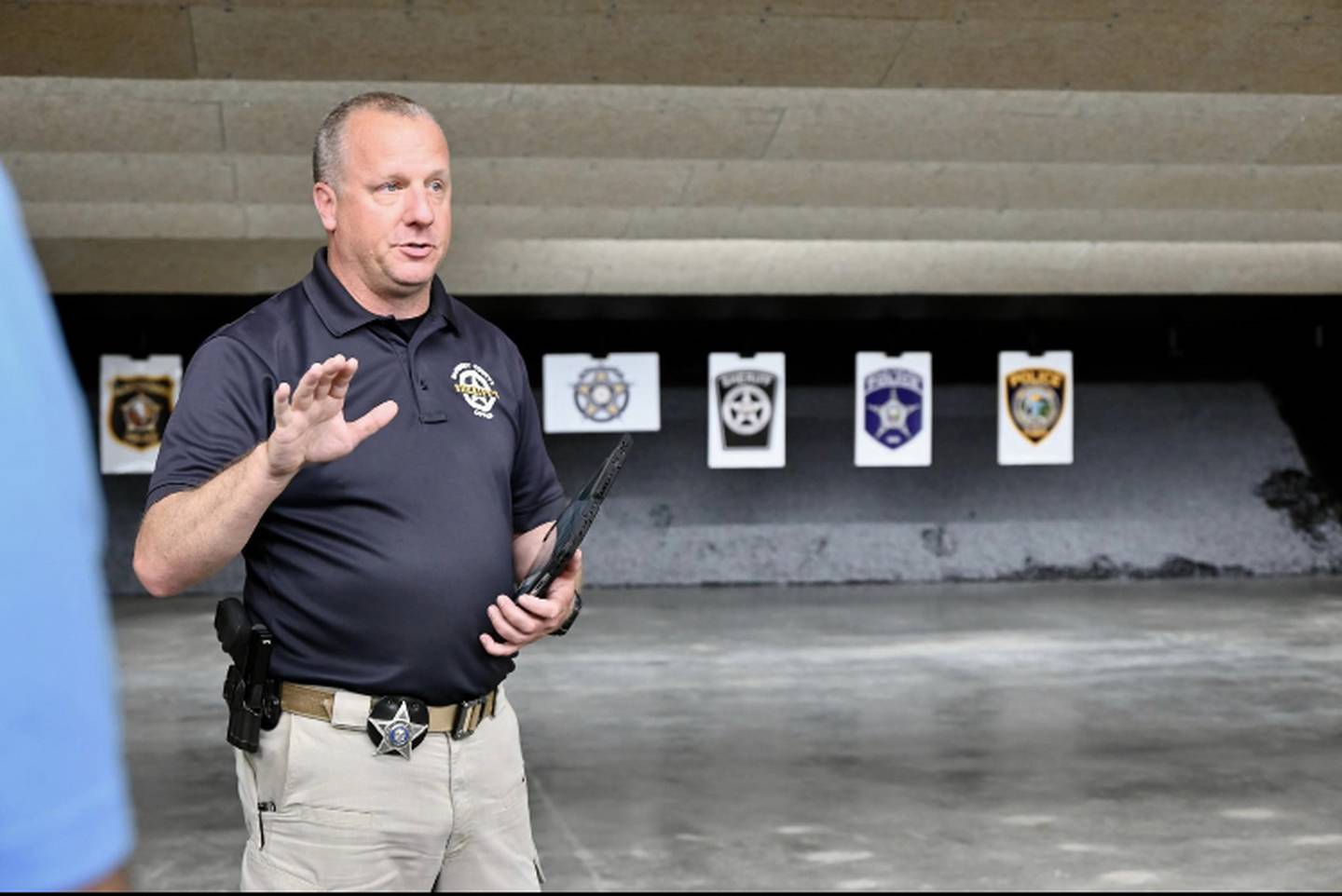 Eric Ellis goes through the McHenry County Regional Training Center Firearms Facility in Cary.