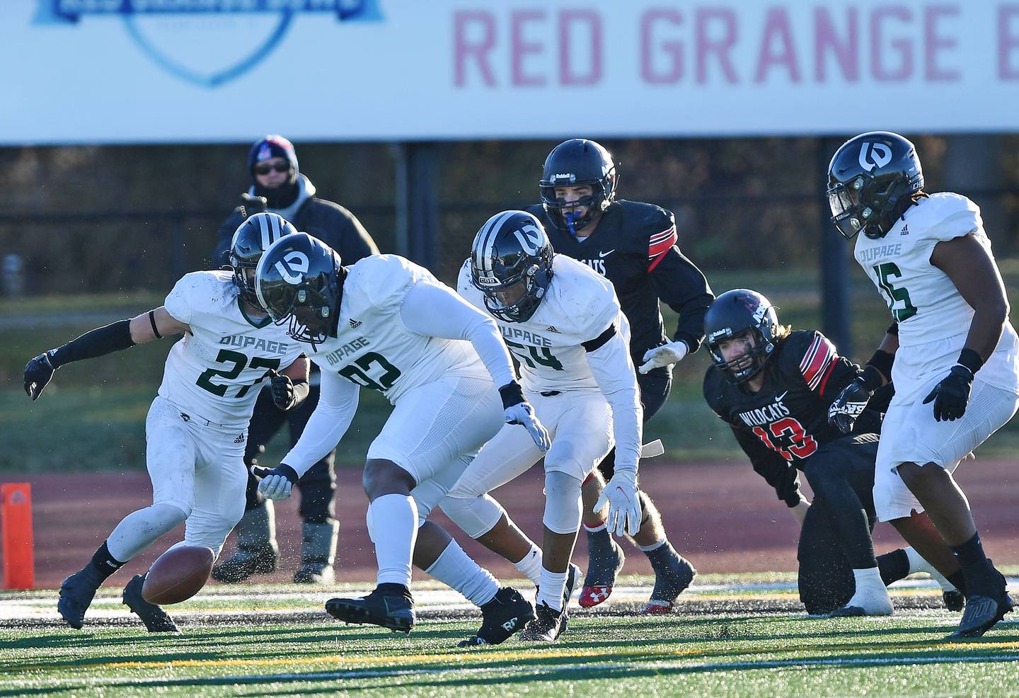 North Dakota State College of Science quarterback Graedyn Buell (13) watches helplessly as College of Dupage's defense surrounds the ball he fumbled on a two point conversion attempt during the NJCAA DIII National Championship game on Dec. 3, 2022 at College of Dupage in Glen Ellyn.