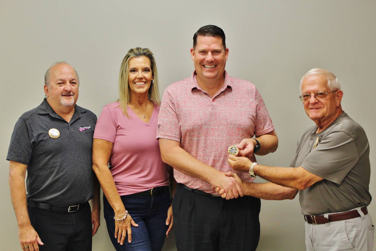 Morris Mayor Chris Brown purchases button number 2024, the first sold for this year from Board Members John Sparrow, Cindie Hunt and Jim Maskel