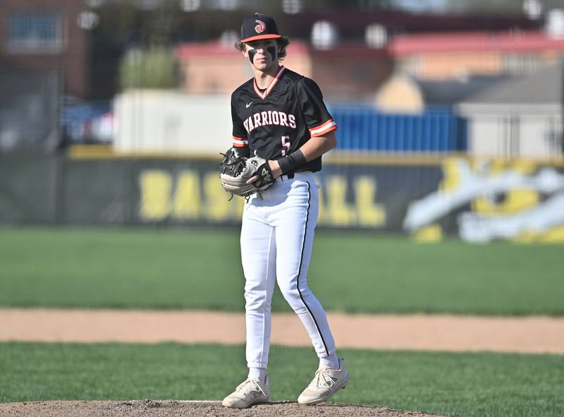 Lincoln-Way West's Lucas Acevedo reading signals from the mound during the non-conference game against Joliet West on Friday, April. 19, 2024, at Joliet.