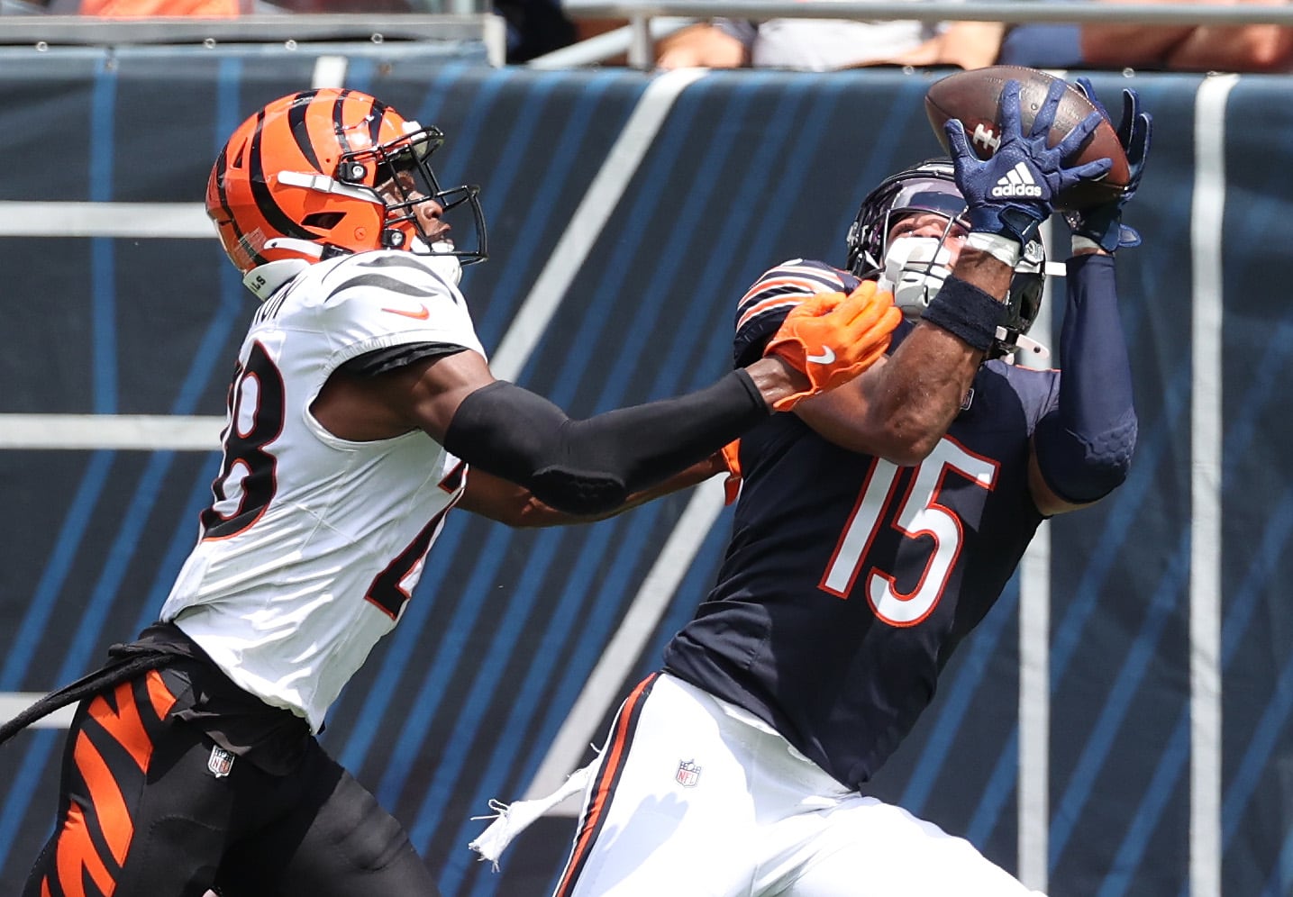 Chicago Bears wide receiver Rome Odunze makes a catch in front of Cincinnati Bengals cornerback Josh Newton during their game Saturday, Aug. 17, 2024, at Soldier Field in Chicago.