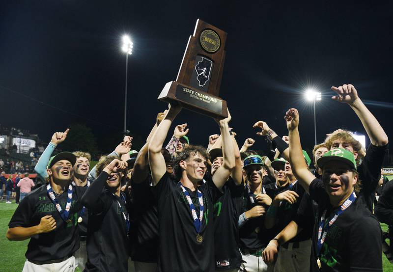 Providence players celebrate their championship trophy after their 4-1 victory over Conant during the Class 4A state baseball championship game at Duly Health and Care Field on Saturday, June 8, 2024 in Joliet.