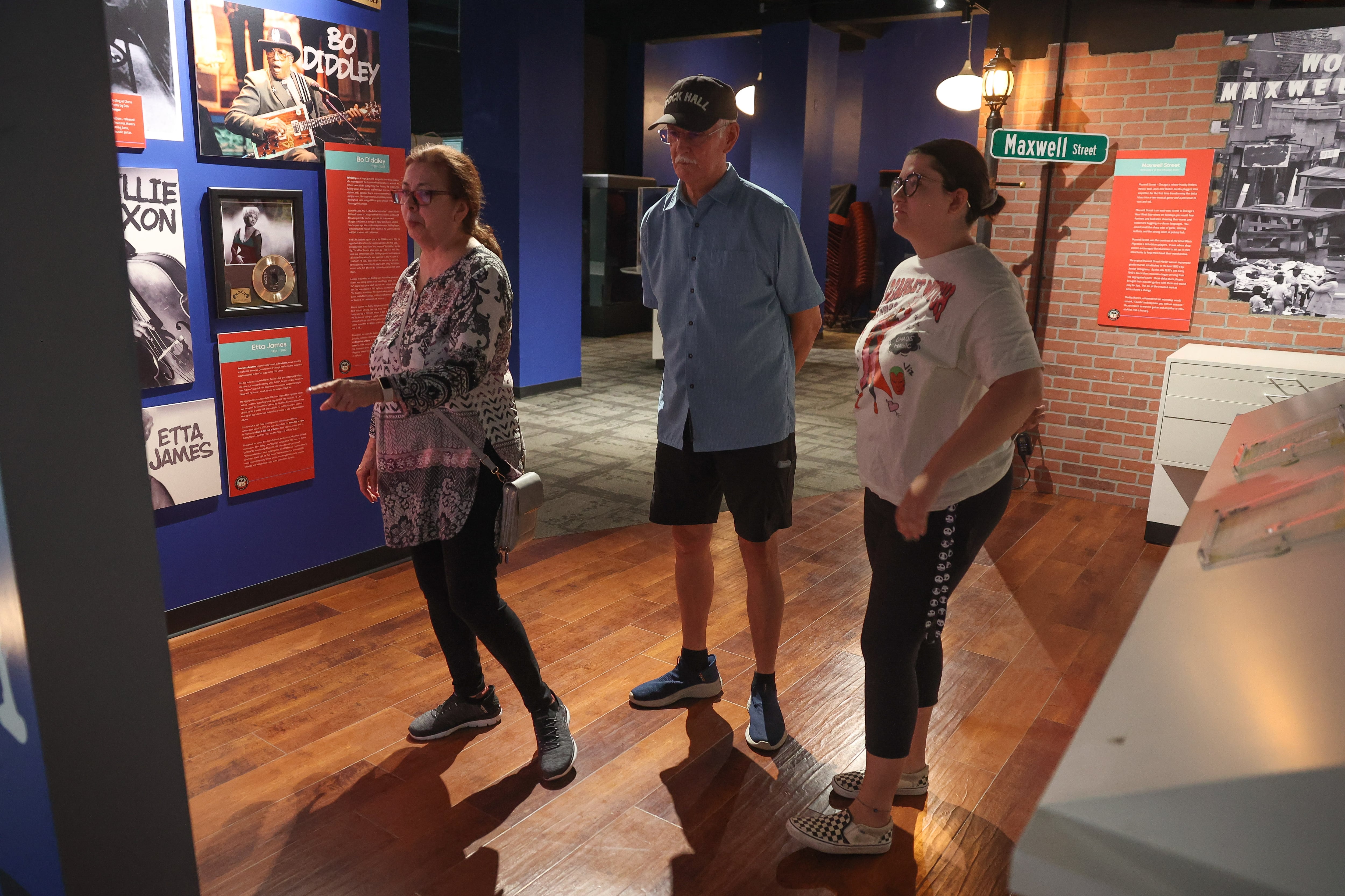 Brenda and Danny Dwyer bring their grandduaghter Kailey Dwyer, studying music, to the Illinois Rock & Roll Museum on Route 66 on Thursday, Aug. 8, 2024 in Joliet. The Museum recently reopened after shutting down for several weeks after the July 14th storm damaged the building.