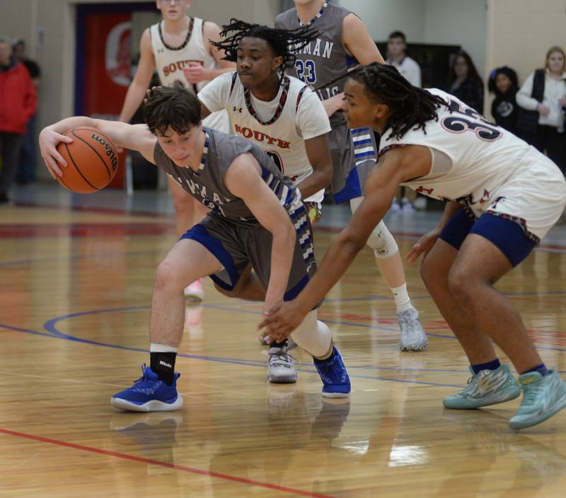 Sterling Newman's Garret Matznick (3) protects the ball against South Beloit's Syncere Fane (35) during the championship game at the Oregon Thanksgiving Tournament on Saturday, Nov. 25, 2023 at the Blackhawk Center in Oregon.