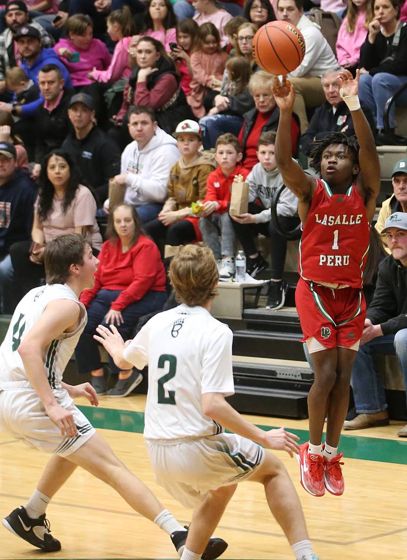 L-P's Cordell Wheatley shoots a wide-open jump shot over St. Bede's Logan Potthoff and Kaden Nauman on Wednesday, Feb. 14, 2024 at St. Bede Academy.