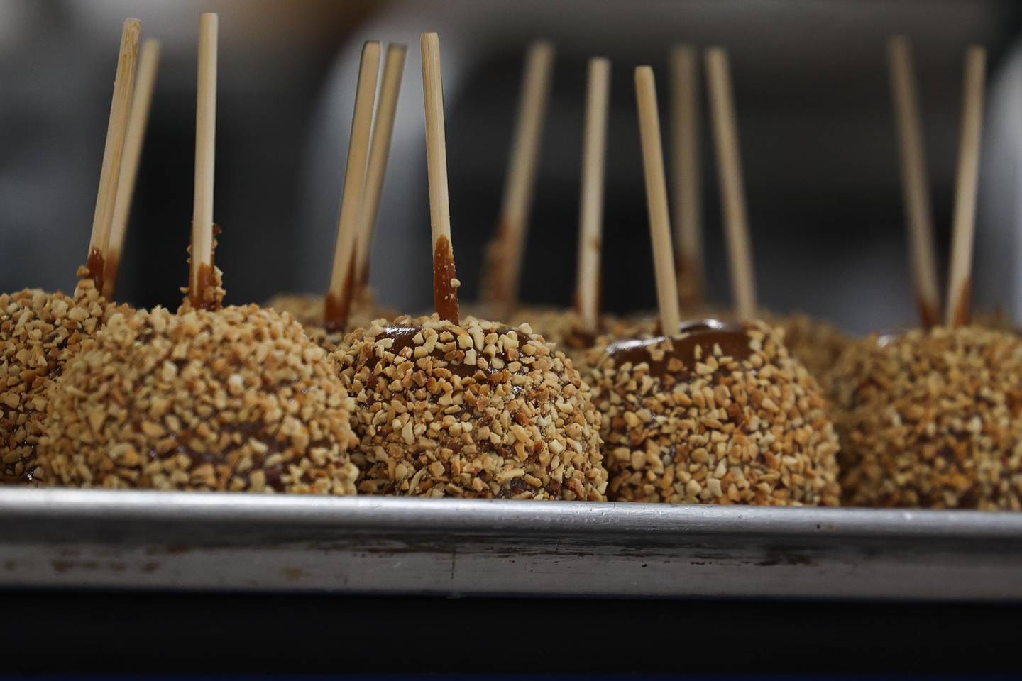 A fresh batch of candy apples wait to be wrapped at Candy and Corn on Wednesday, August 28, 2024 in Plainfield.