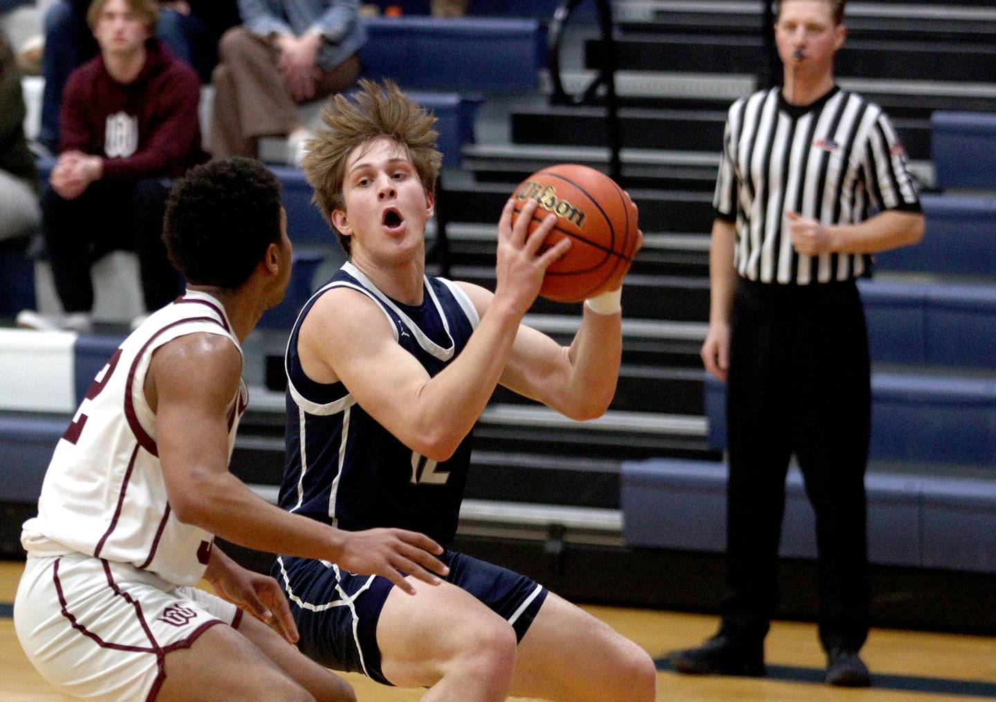 Cary-Grove’s Jake Hornok moves the ball against Wheaton Academy during Class 3A regional action in Cary on Wednesday night.