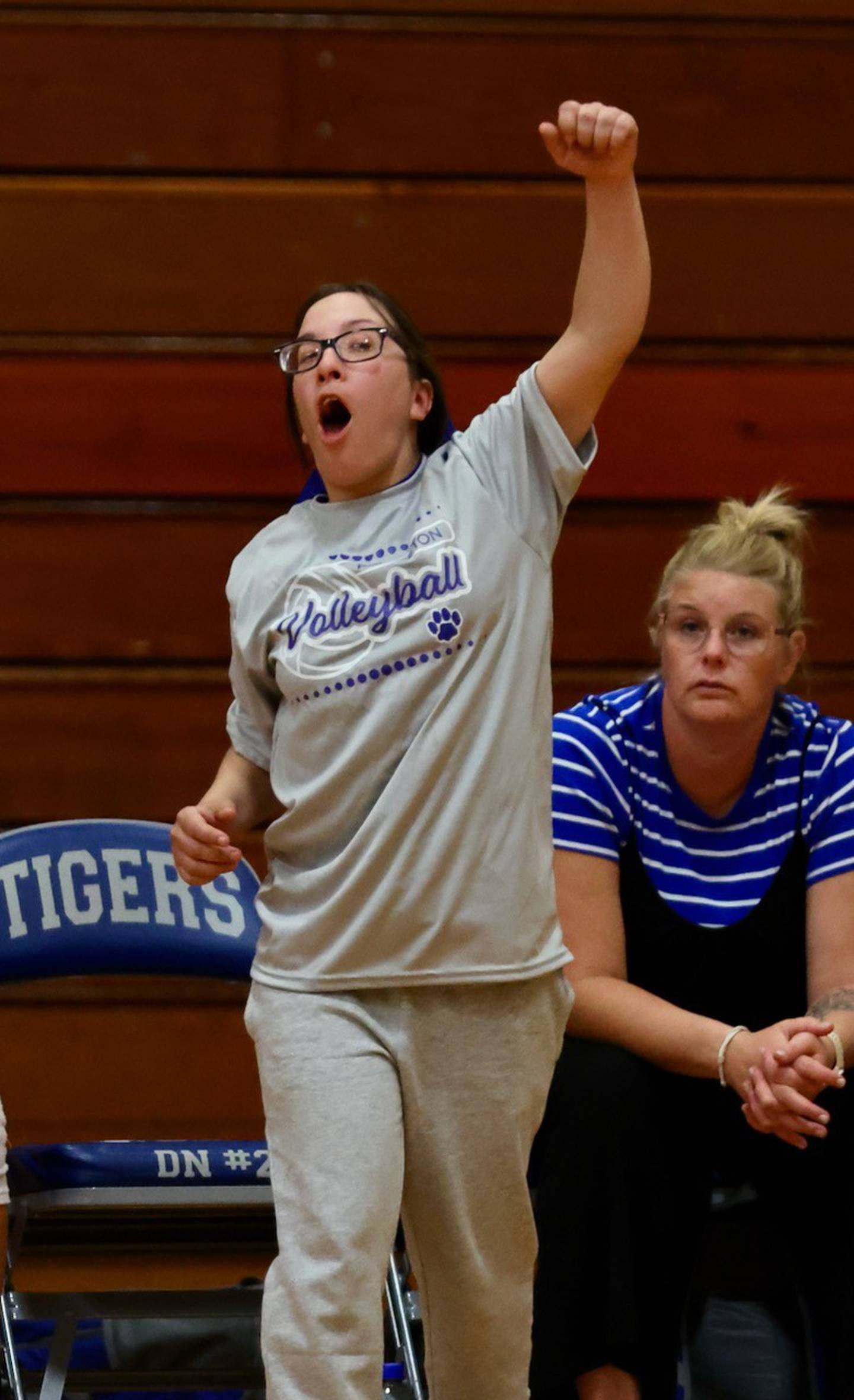 Princeton manager Kyla Kissick cheers on the Tigresses Tuesday night at Prouty Gym.