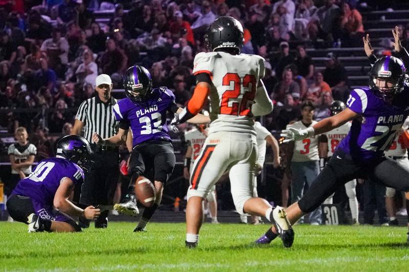 Plano's Colby Byrd (33) kicks a field goal against Sandwich during a football game at Plano High School on Friday, Sep 13, 2024.