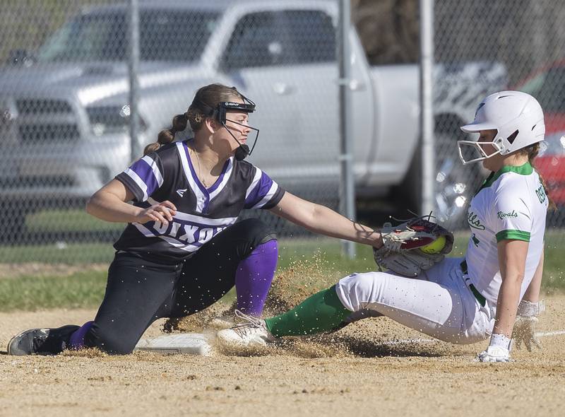 Dixon’s Elly Brown puts the tag on Rock Falls’ Olivia Osbourne late Tuesday, April 9, 2024 at Reynold’s field in Dixon.