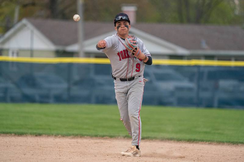 Yorkville's Daniel Rodriguez (9) fields a grounder and throws to first for an out against West Aurora during a baseball game at West Aurora High School on Monday, April 24, 2023.