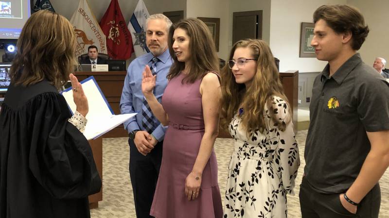 Jayme Muenz was sworn in alongside her family Monday May 1, 2023, as Ward 2 Alderperson by the honorable Judge Elizabeth Flood at St Charles City Council meeting at 2 Main St.