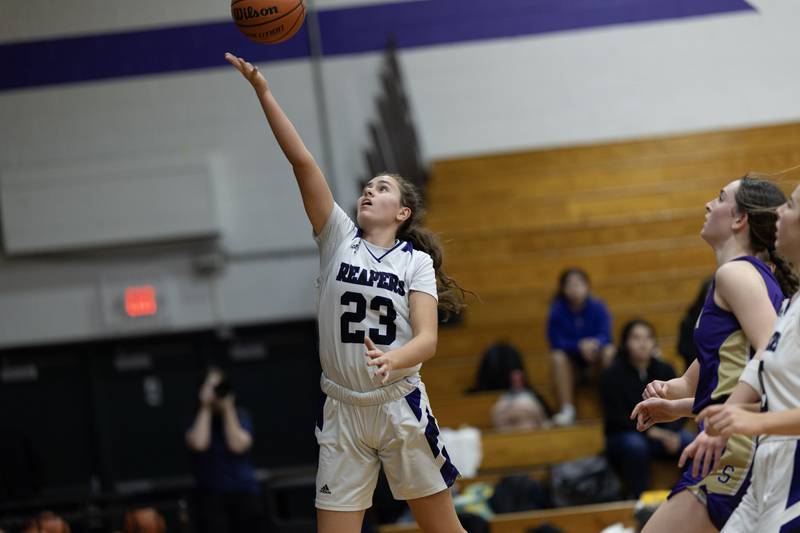 Plano's Josie Larson goes up for two of her 16 points during Thursday's game with Serena.