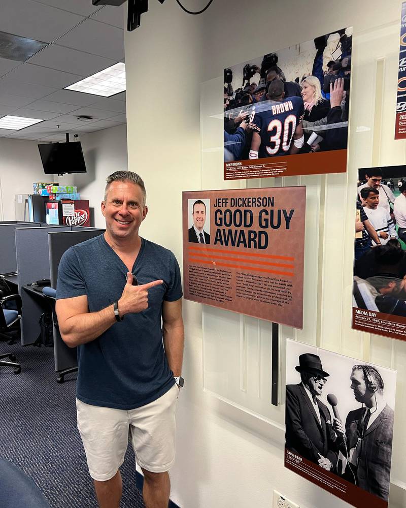 Marc Silverman, ESPN-1000 radio host, stands by a picture of late colleague Jeff Dickerson.