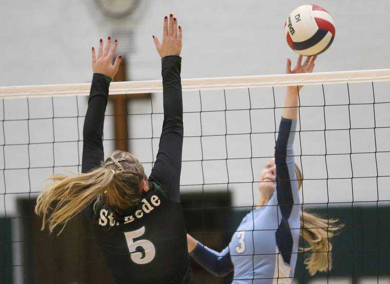 Bureau Valley's Taylor Neuhalfen tips the ball past St. Bede's Emma Smudzinski on Monday, Sept. 9, 2024 at St. Bede Academy.