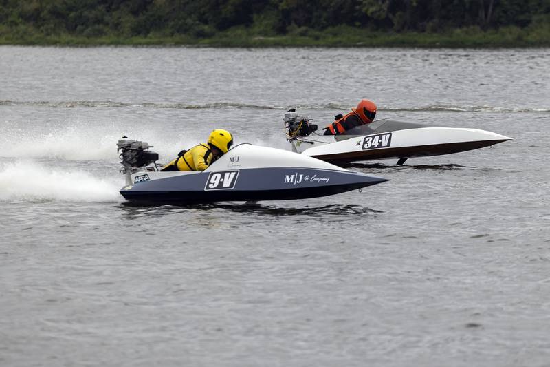 James Schallcross (left) and Holden Mackey run side by side in a heat Saturday, August 26, 2023 in Rock Falls.