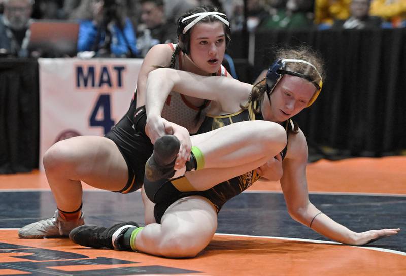 Batavia’s Sydney Perry controls Goreville’s Alivia Ming in the 145-pound bout at the girls wrestling state finals at Grossinger Motor Arena in Bloomington on Saturday, Feb. 24, 2024.