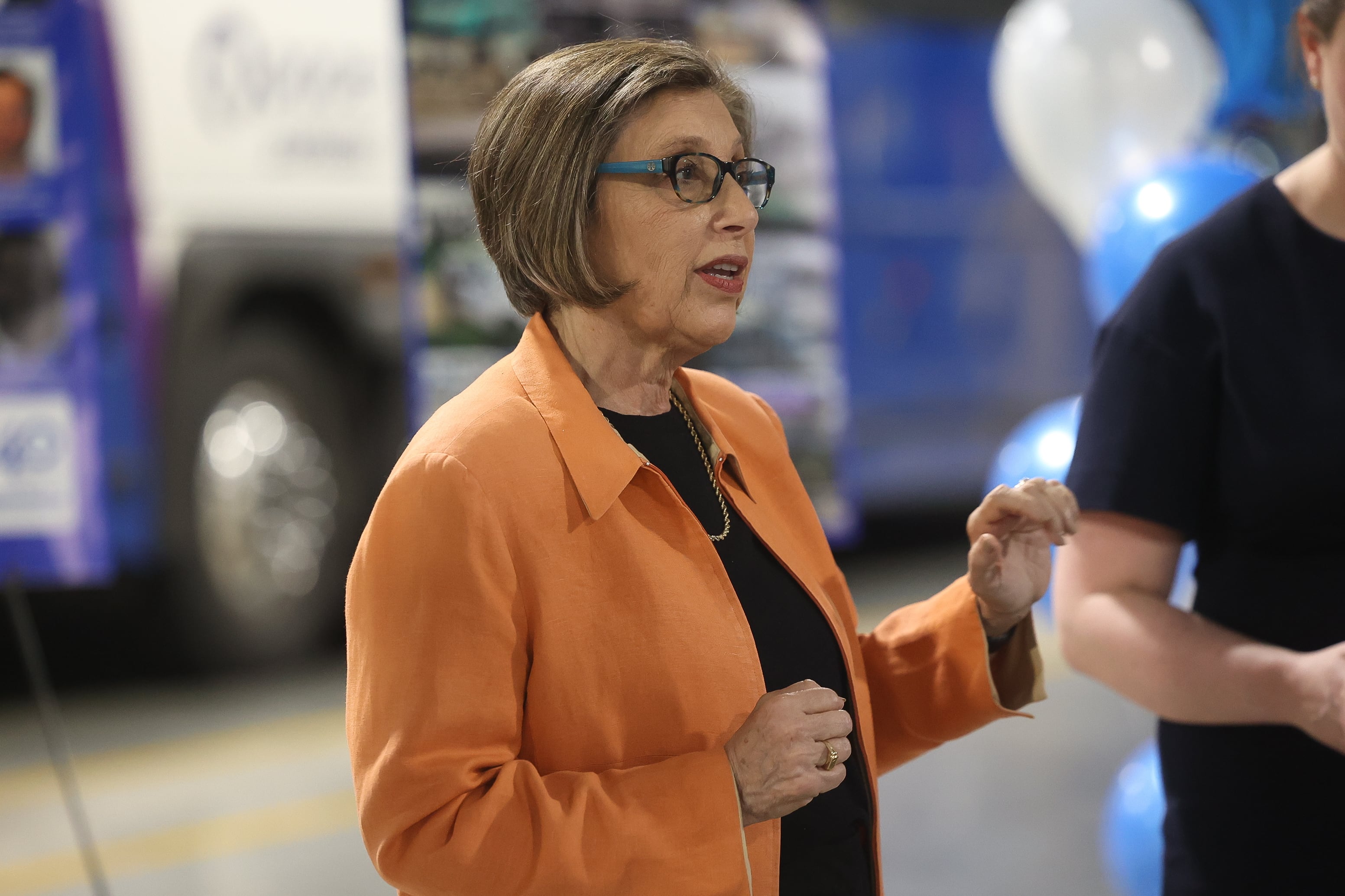 Pace Executive Director Melinda Metzger speaks with State Representative Lauren Underwood at Pace’s bus depot on Monday July 1, 2024 in Plainfield.