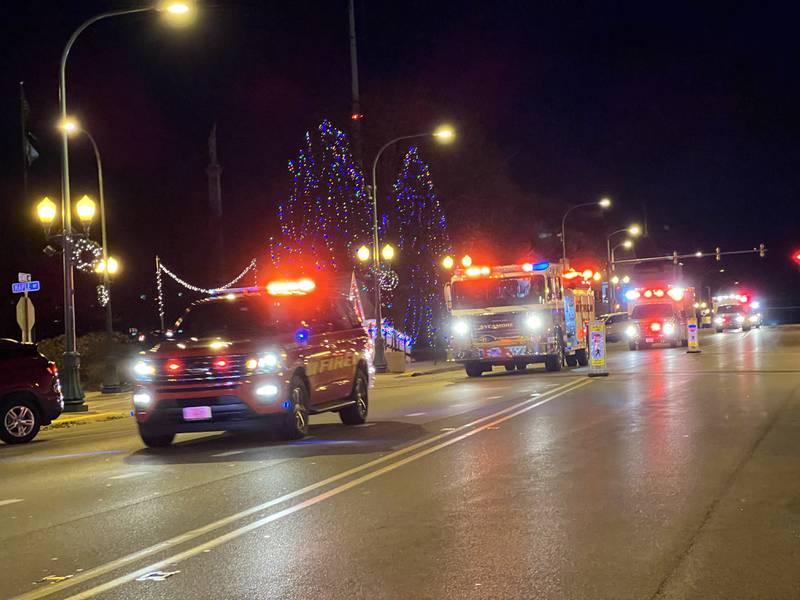 Sycamore police briefly shut down a portion of Illinois Route 64 in downtown Sycamore on Monday, Dec. 18, 2023, to help welcome a motorcade for longtime Sycamore firefighter Brad Belanger's return home from Northwestern Medicine Central DuPage Hospital.