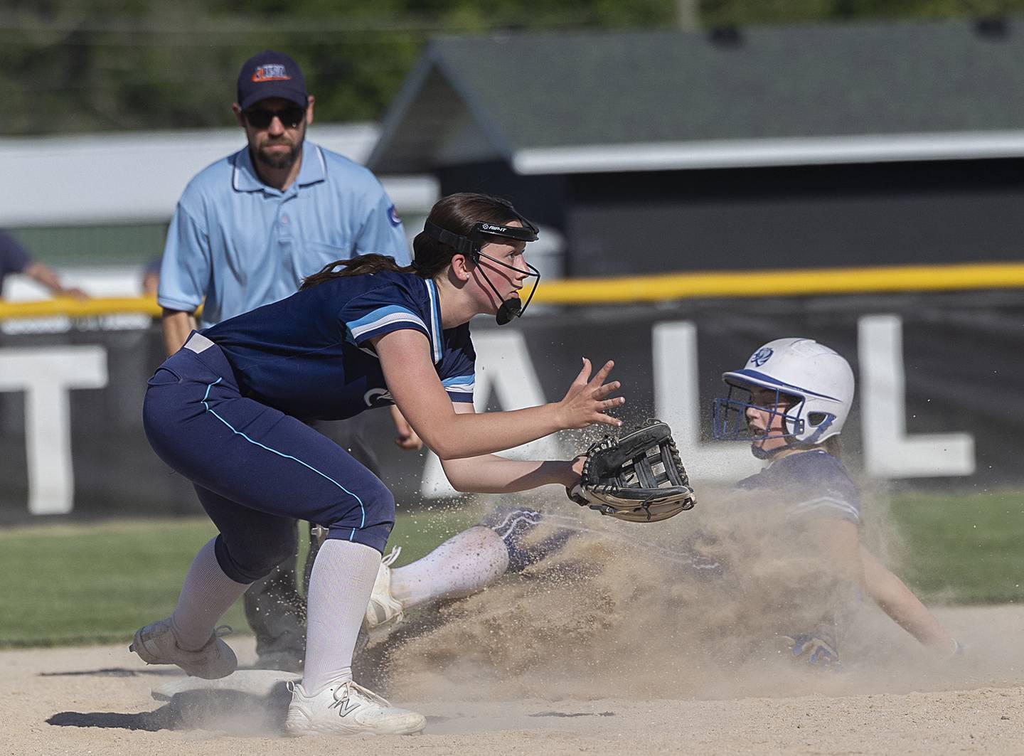 Bureau Valley’s Lesleigh Maynard waits for the throw as Princeton’s Makayla Hecht slides in safe Friday, May 17, 2024 at the Class 2A regional semifinals in Rock Falls.