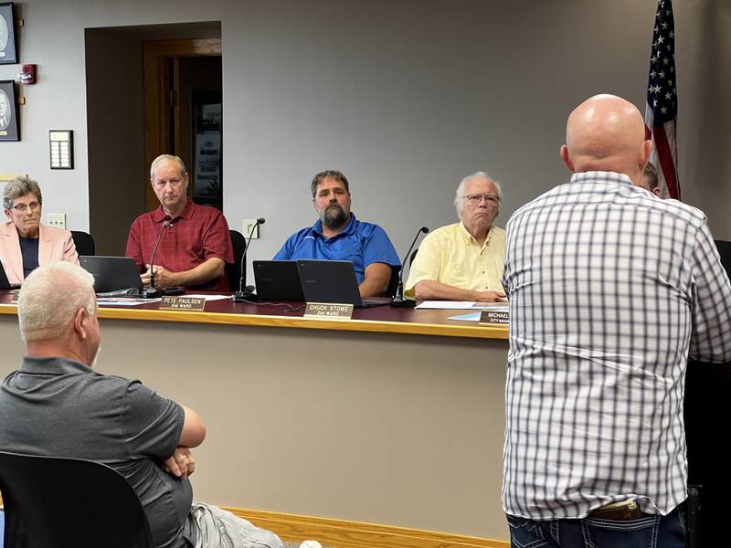 First Ward Alderpersons Alicia Cosky and Alan Bauer, as well as 2nd Ward Alderpersons Pete Paulsen and Chuck Stowe listen to Brain Grainger explain why he sought to increase the number of units in the second phase of the Old Mill Park community development during a Sycamore City Council meeting on Aug. 19, 2024.